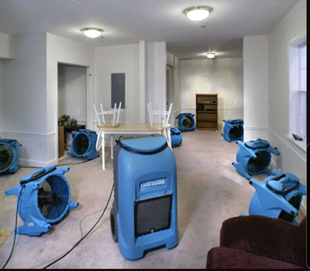 Air movers and dehumidifier setup for Water Extraction & Removal in Byram